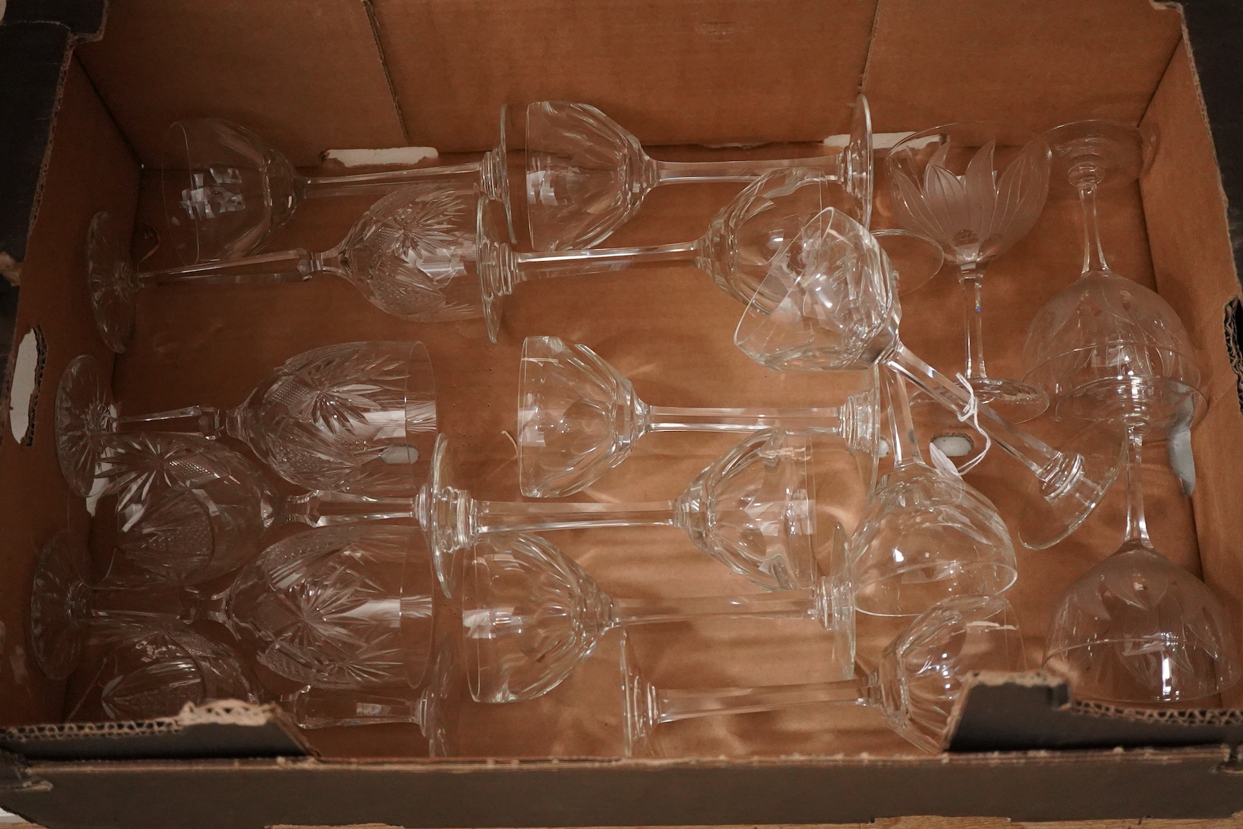 A mixed collection of cut glass wine glasses, spirit and other drinking glasses etc